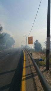 road to Har Adar in smoke